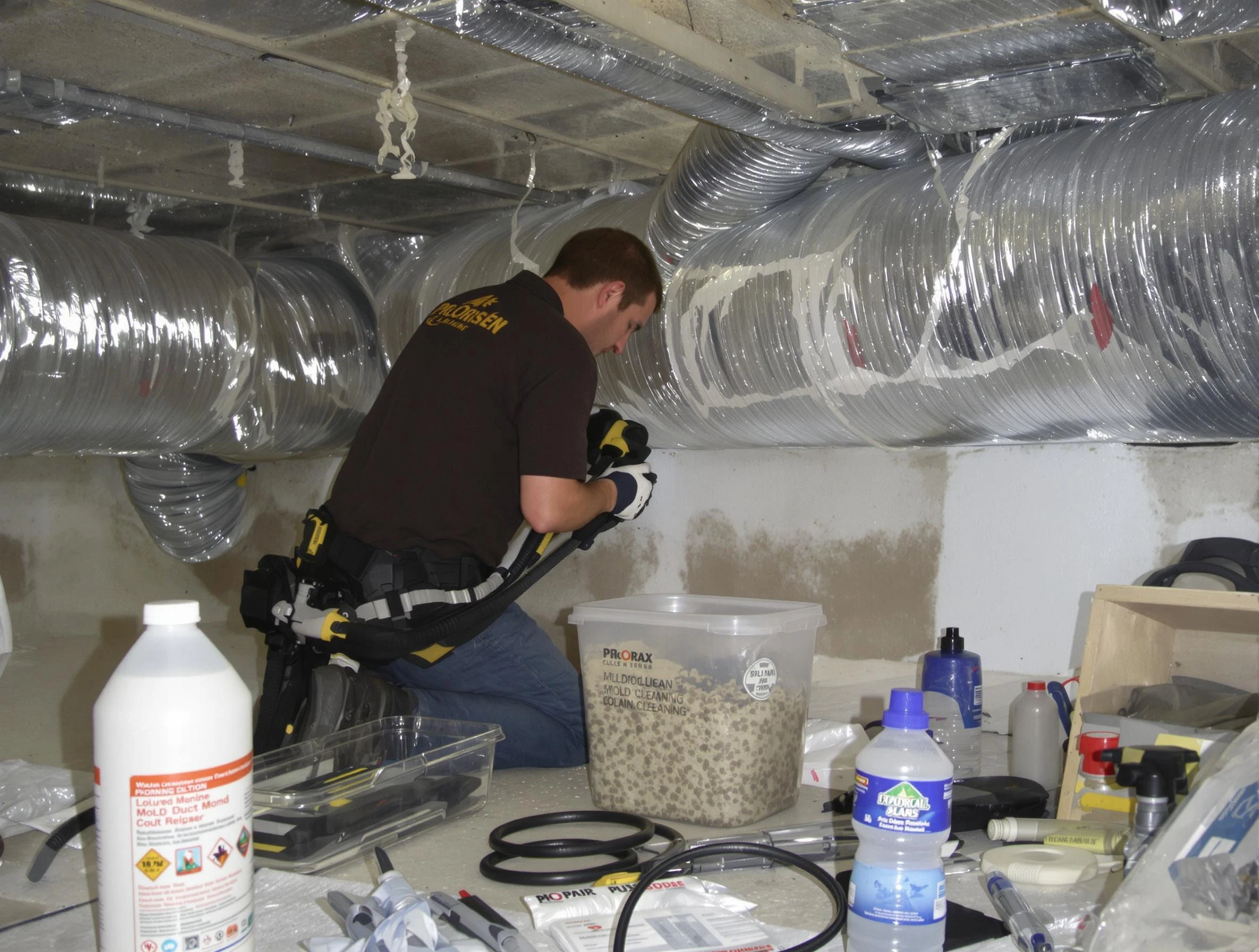 Billerica Air Duct Cleaning specialist performing professional mold removal from air ducts in Billerica